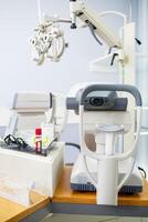 Microscopic apparatus for testing eyesight. Ophthalmology and treatment of eye diseases. Eye clinic, optometrist concept photo