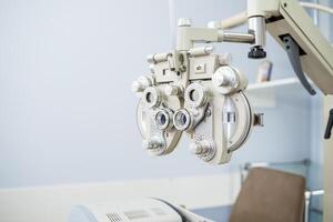 Microscopic apparatus for testing eyesight. Ophthalmology and treatment of eye diseases. Eye clinic, optometrist concept photo