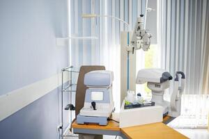 Microscopic apparatus for testing eyesight. Ophthalmology and treatment of eye diseases. Eye clinic, optometrist concept photo