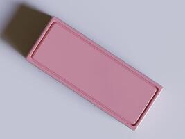 A pink rectangular box sitting on a table photo