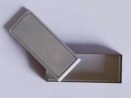 A silver box with a lid on top photo
