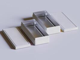 Three white boxes with a lid on each side photo