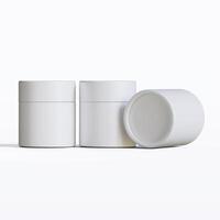 Three white containers with lids on a white surface photo