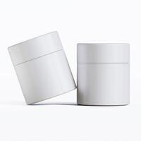 Two white containers with lids on a white surface photo
