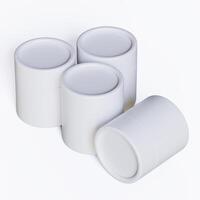 Three white containers with lids on a white surface photo