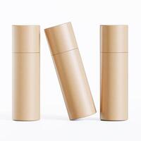 Three empty cardboard tubes on a white surface photo