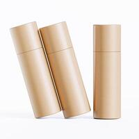 Three empty cardboard tubes on a white surface photo
