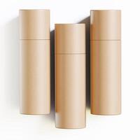 Three empty cardboard tubes on a white surface photo