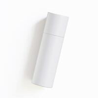 A white container with a lid on a white surface photo