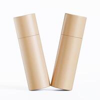 Two empty cardboard tubes on a white surface photo