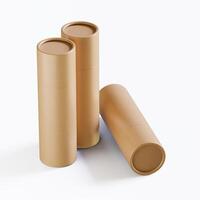 Three empty cardboard tubes on a white surface photo