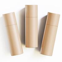 Three empty cardboard tubes on a white surface photo