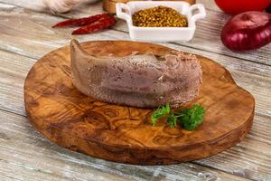 Steamed pork tongue with mustard photo