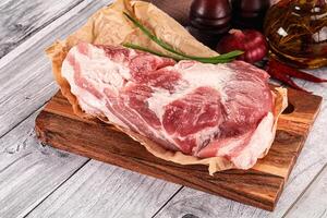 Raw pork shoulder for cooking photo