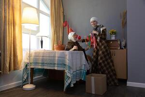 Two women sitting at a table photo