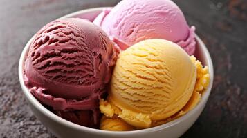 Bowl contains three scoops of various flavors of ice cream, each with a distinct color, food setting photo