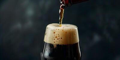 Stout beer being poured into a glass from a bottle, foam rising to the top, food setting photo