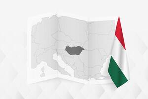 A grayscale map of Hungary with a hanging Hungarian flag on one side. Map for many types of news. vector