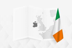 A grayscale map of Ireland with a hanging Irish flag on one side. Map for many types of news. vector