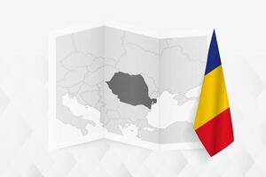 A grayscale map of Romania with a hanging Romanian flag on one side. Map for many types of news. vector