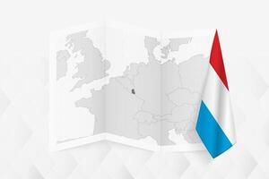 A grayscale map of Luxembourg with a hanging Luxembourgish flag on one side. Map for many types of news. vector