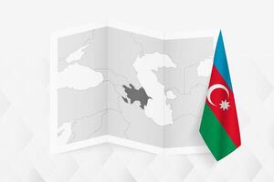 A grayscale map of Azerbaijan with a hanging Azerbaijani flag on one side. Map for many types of news. vector