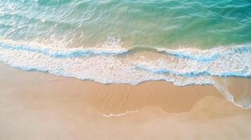 serene beach with gentle waves lapping at sandy shore, creating peaceful atmosphere. turquoise water contrasts beautifully with light sand, inviting relaxation photo