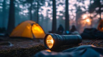 A flashlight is sitting in the middle of a forest photo