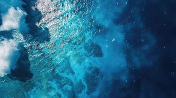 An aerial view of the ocean and clouds photo
