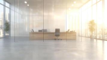 Empty office with large windows and a desk photo