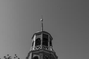 A clock tower with a clock on it photo