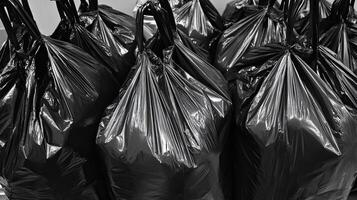 Pile of black garbage bags. Waste disposal concept. photo