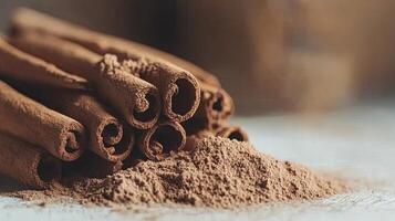 Cinnamon sticks and powder. Aromatic spice concept. photo