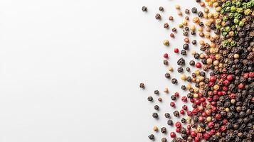Colorful peppercorns on white background. Food photography concept. photo