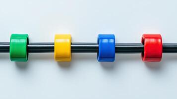 Colorful rings on a black rod. Concept of connection, sequence, and process. photo