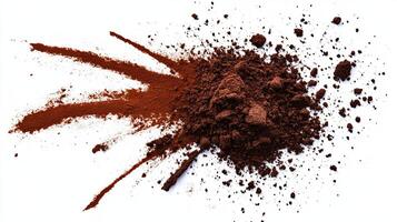 Cocoa powder explosion. Food and drink concept. photo