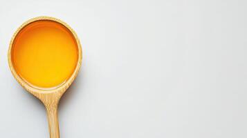 Spoon of Ghee, clarified butter. Healthy cooking concept. photo