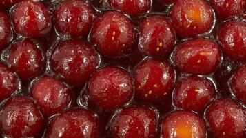 Close up of Red Cherries in Syrup photo