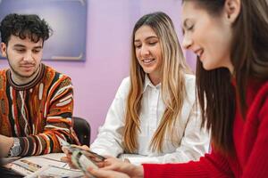 Group of students learning together at language school class photo