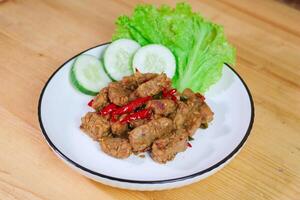 Orek tempe or Sauteed Tempeh is a typical Indonesian cuisine with herbs, garlic, onion, chilli and soy sauce. It tastes delicious photo