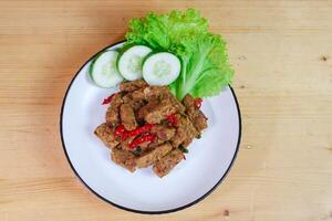 Indonesian Food - Tempeh Sweet Soy Sauce or Orek Tempe. Top View with Copy Space for Advertisement photo