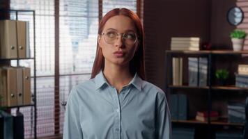Caucasian pensive thinking thoughtful unsure hesitate pondering think idea clever plan solution businesswoman girl lady in glasses female business woman in office indoors company work decide decision video
