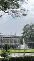 Frontal perspective of Independence Palace or Reunification Palace Dinh Doc Lap is designed a main public landmark in the afternoon by architect Ngo Viet Thu video