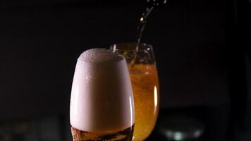 slow motion of pouring beer into pint. Filmed on high speed cinema camera. Speed ramp effect. video