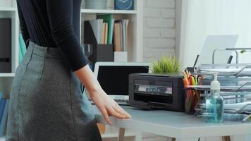 Organizing a modern home office with efficient workspace arrangement and printer setup video