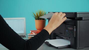 How to set up a multifunction printer at home for efficient document management in your workspace video