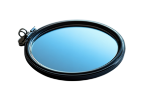 Reflective round mirror with a black frame resting on a smooth surface in natural light png