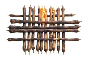 Sticks arranged in a grid pattern with some ignited in a creative display at a crafting workshop png