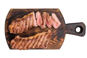 Grilled Tri Tip Steak from Black Angus beef meat isolated on white background photo