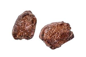 Grilled fillet mignon or tenderloin beef steak Isolated on white background, top view. photo